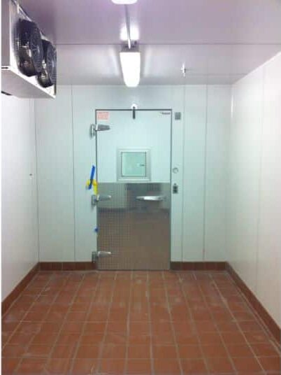 Combination walk-in cooler and freezer