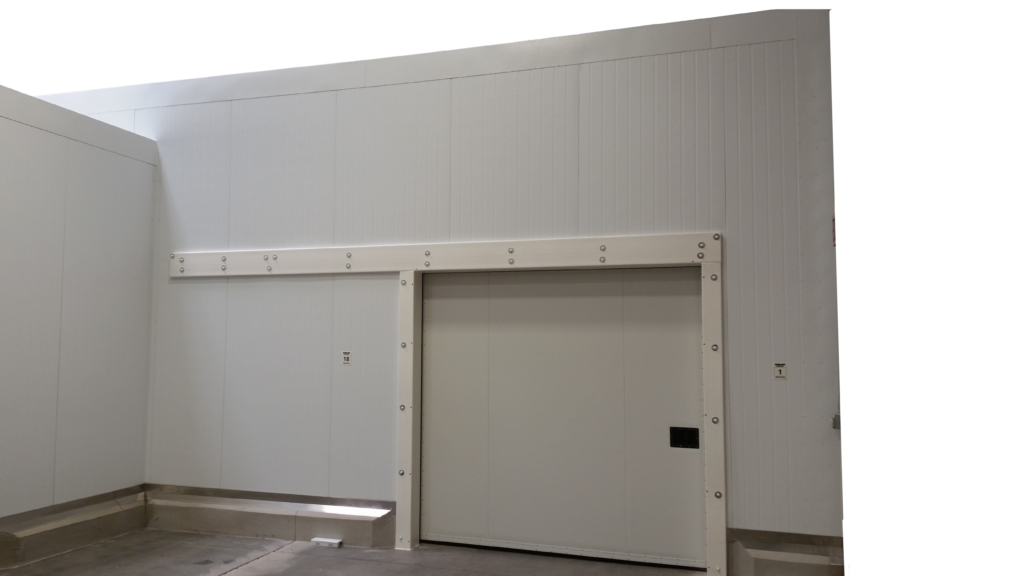 Large wall made of insulated panels set against a clear white background