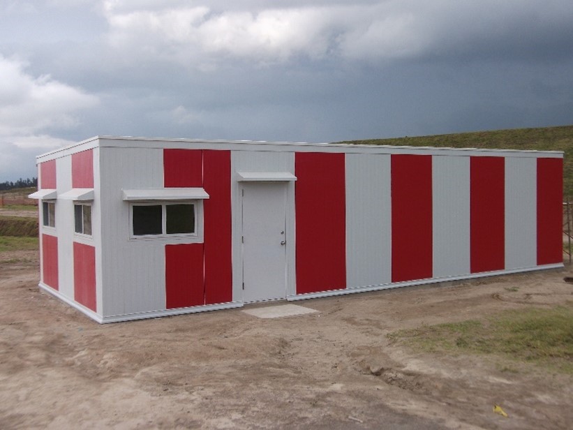 Custom outdoor walk-in used to store items that require temperature control. Vertical alternating panels in white in red