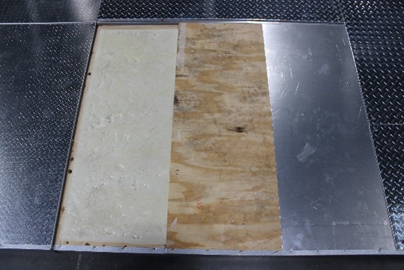 Deconstructed floor panel showing the different layers of manufacturing