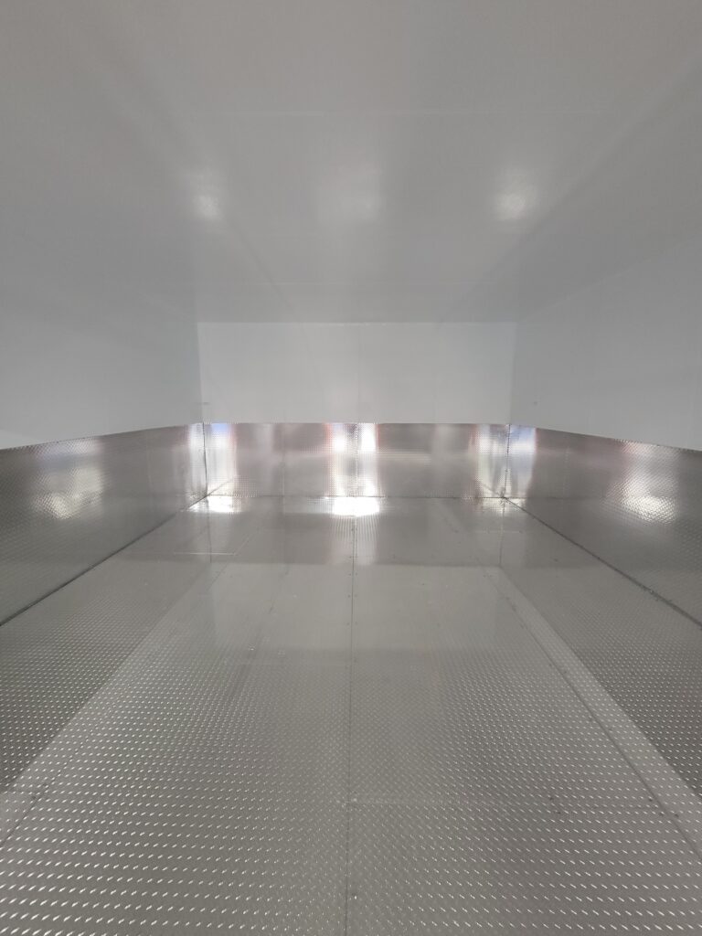 Interior of walk-in showcasing metal flooring