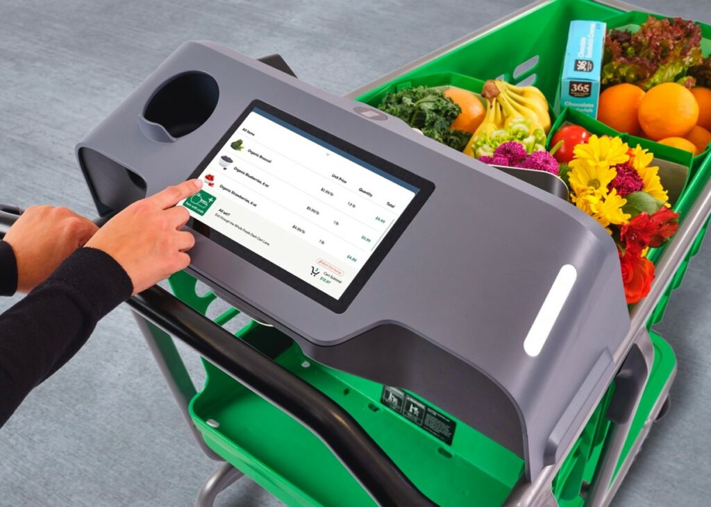 Grocery Store Shopping Cart with Digital screen that automatically scans food placed in cart allowing for payment on your cart
