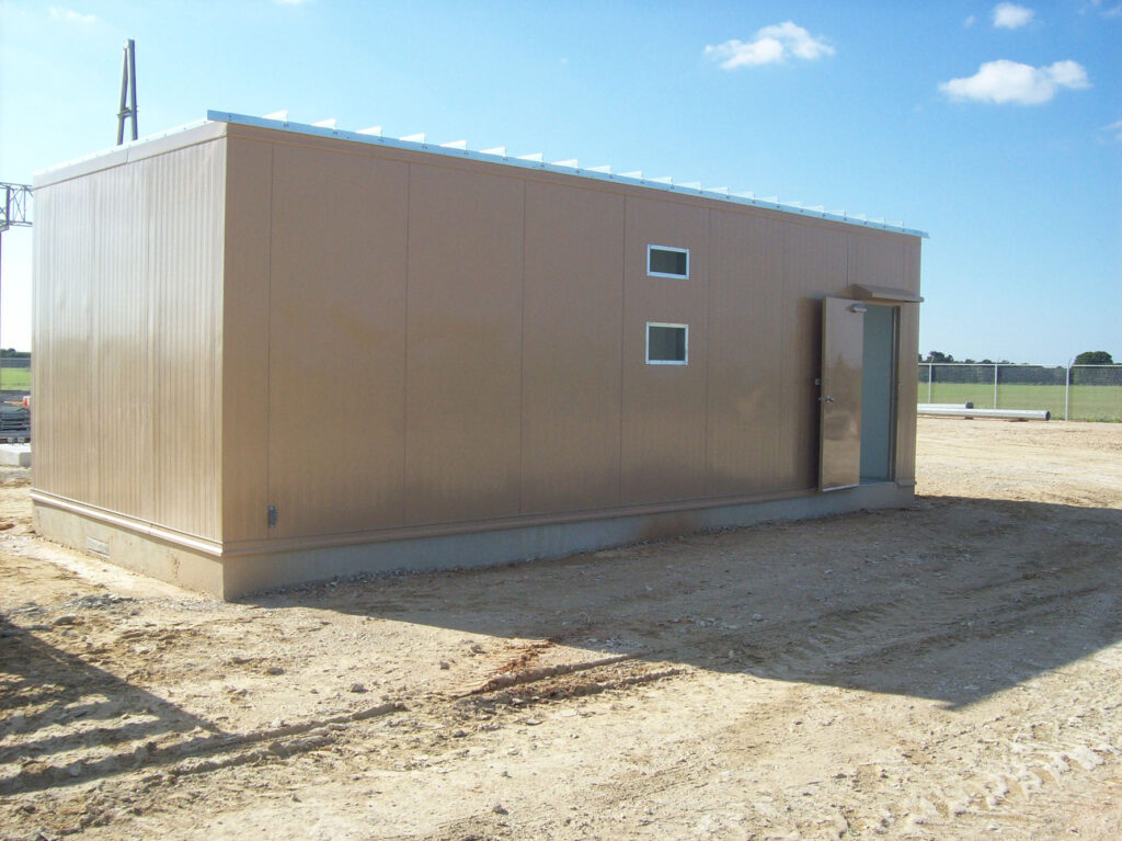 outdoor utility enclosure used to protect utility equipment within.