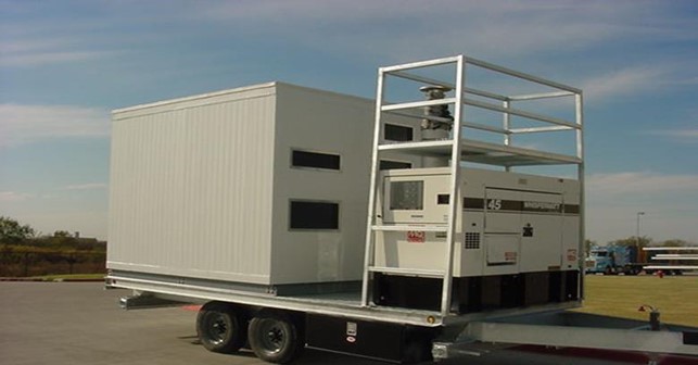 Utility enclosure on a truck bed waiting to be shipped and installed.