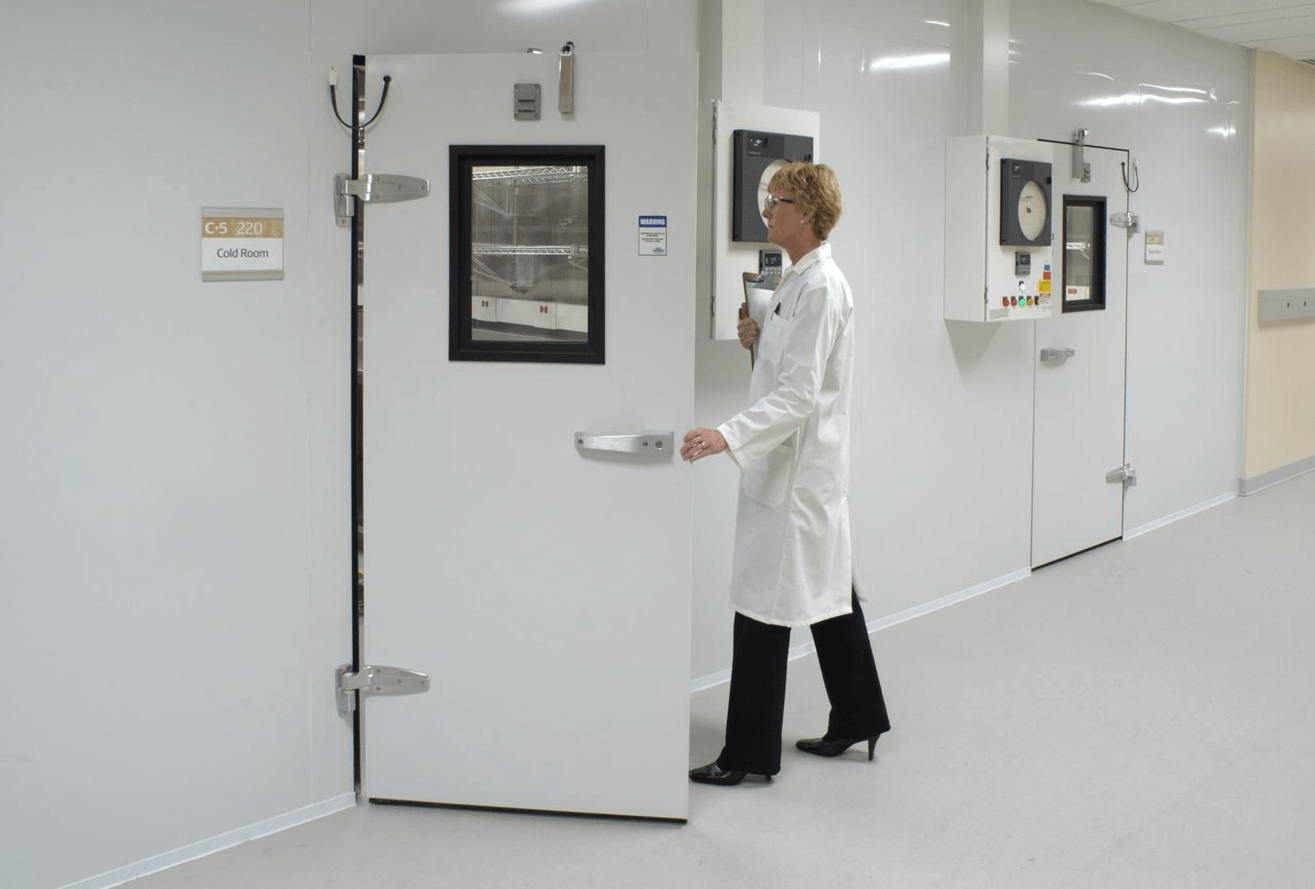 Researcher entering specialized walk-in environment